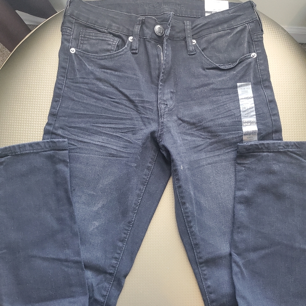 Juniors faded black denim